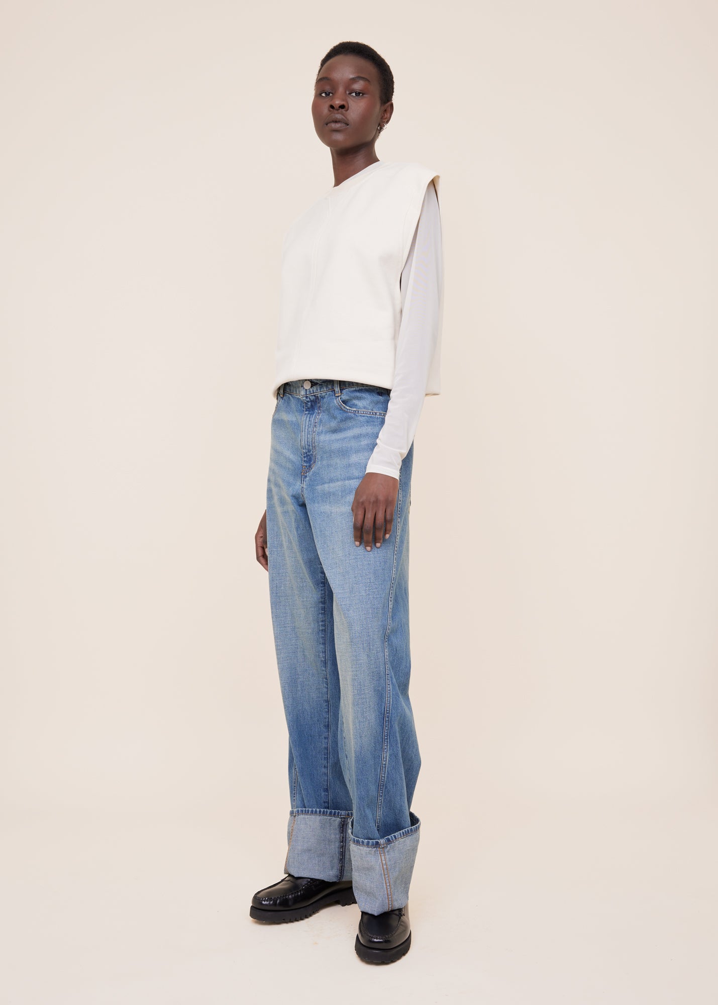 Mouwloze sweater deals