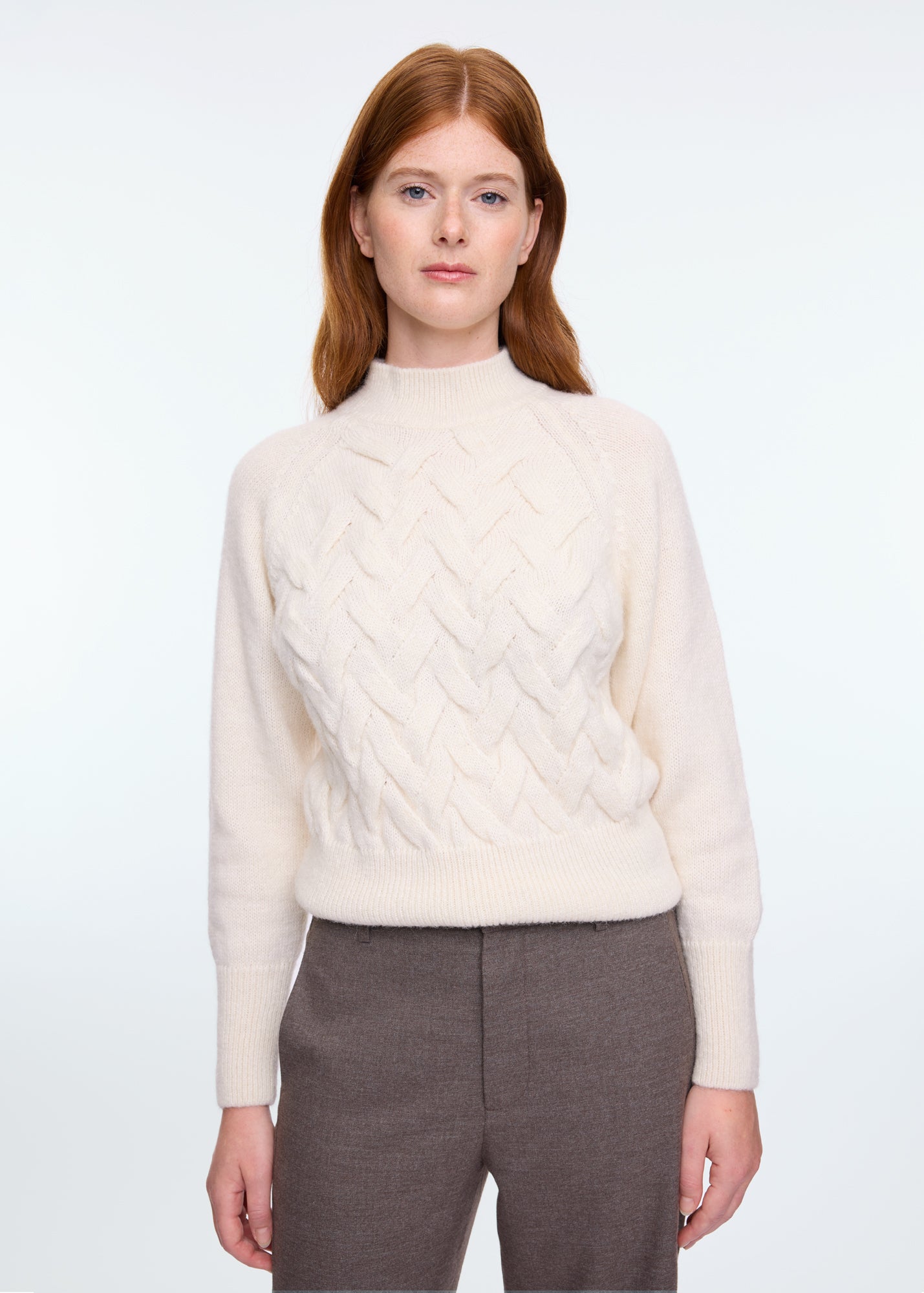 Knitted cable sweater