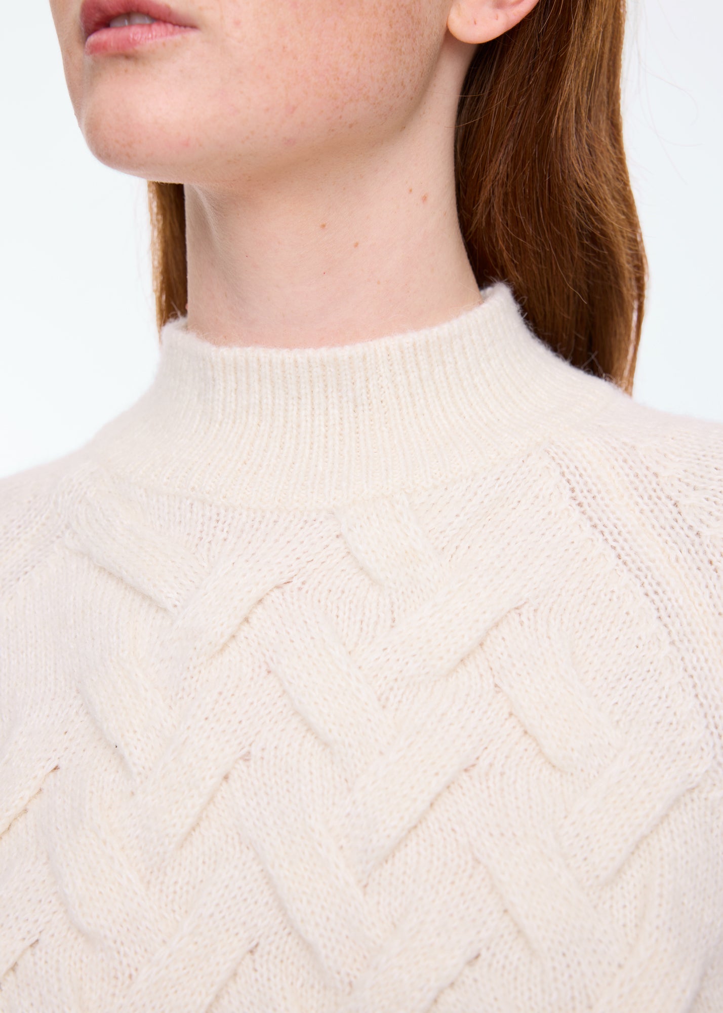 Knitted cable sweater